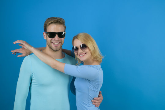 Simple joy of loving. Love relations. Couple in love. Couple of man and woman wear fashion glasses. Fashion models in trendy sun glasses. Friendship day. Friendship relations. Fresh sight, copy space