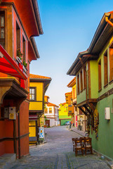 Fototapeta na wymiar Street with Colorful Houses and cobbles in Eskishehir City, Turkey