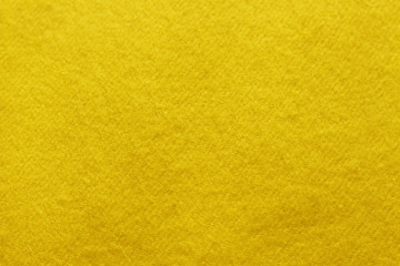 trend Ceylon yellow woolen background, texture, close-up