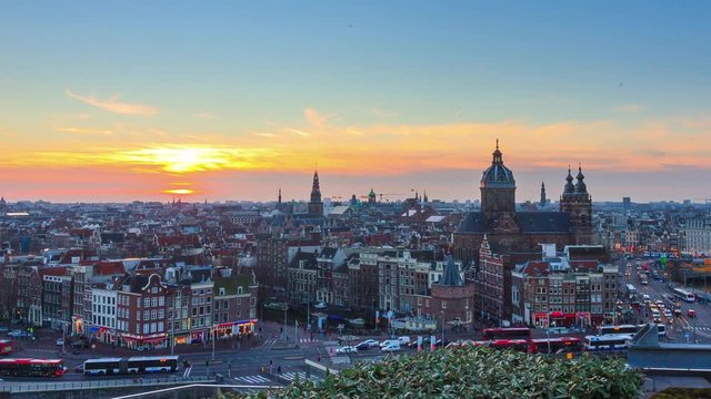 Beautiful 4k UHD cityscape timelapse at sunset of the skyline of Amsterdam, the Netherlands 