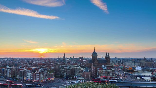 Beautiful 4k UHD cityscape timelapse at sunset of the skyline of Amsterdam, the Netherlands 