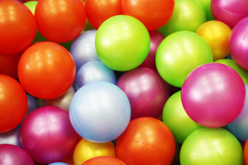 Colorful Rainbow dragee balls background.