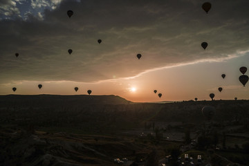 Silhouetes of Air Ballons in Cappadocia at Dawn. Cappadocia is known around the world as one of the best places to fly with hot air balloons.