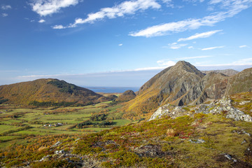 Fototapeta premium Happy walking in the Tiremshattem mountains in Norway mountains 