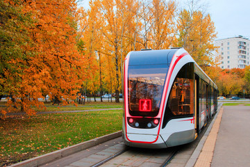 public transport, modern city tram, approaching the bus stop Moscow, Russia