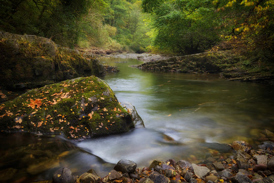 The Afon Pyrddin river near Glynneath on the approach to a popular waterfall called Sgwd Gwladus, South Wales, UK
