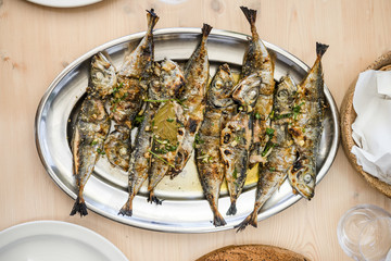 Silver tray full of delicious fish mackerel known as carapau in Portugal