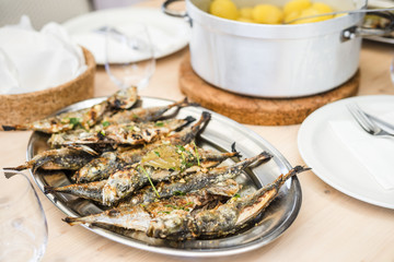 Silver tray full of delicious fish mackerel known as carapau in Portugal