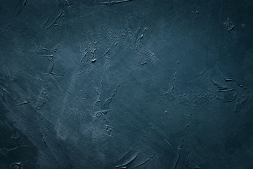 Obraz na płótnie Canvas abstract blue textured background. distressed scratched teal board design for your message. empty space concept