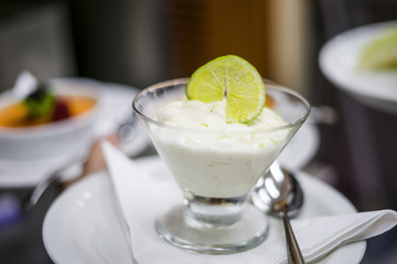 Lime mousse with slice of lime on the top