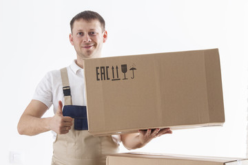 Relocation services concept. Mover man with cardboard box in hands