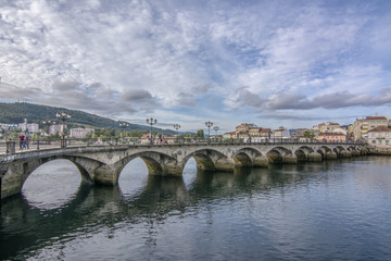 Fototapeta na wymiar Puente romano, Puente del Burgo sobre el rio Lerez en la ciudad de Pontevedra