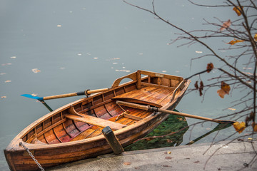 Wooden row boat on a lake