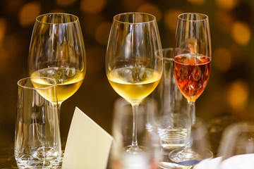 Red and white wine in glasses served for a banquet