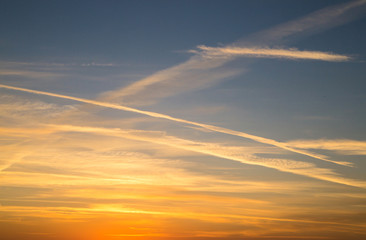 Beautiful panorama of the evening blue sky with colored clouds