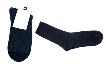 A pair of warm woolen socks on a white background. Isolated