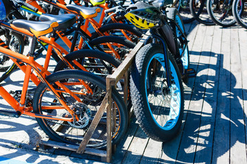 Bicycles on bike parking in a row