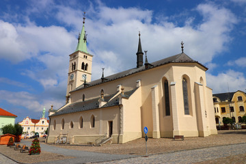 view of the square and the church in Kašperské hory