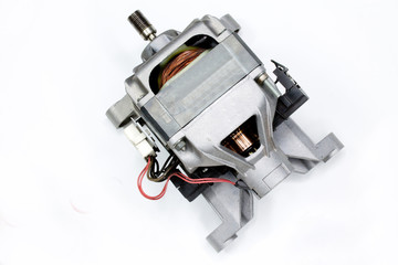 Naklejka premium electric motor from a washing machine isolated on white background