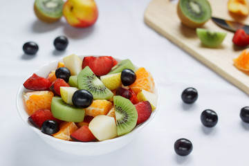 Fresh salad with various fruits. Healthy lifestyle.