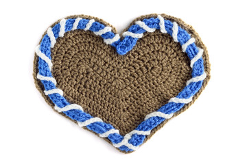 crochet Gingerbread heart shape valentines day gift with copy space on white isolated background
