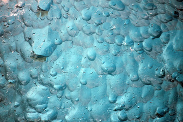 Blue iceberg. Jokulsarlon glacier lake. Glacier floating on the water. Detail view of iceberg in ice lagoon - Jokulsarlon, Iceland. Close up.