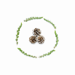 Christmas composition. Wreath of fir branches, cones on white background Flat lay top view copy space, square. Christmas winter decoration, Nature New Year concept minimalism style