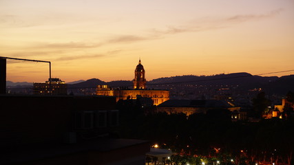 Sunset in Malaga on ancient Gothic cathedral