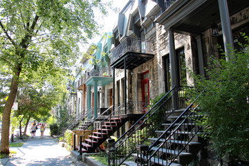 Beautiful houses in a street of Montreal, Canada - obrazy, fototapety, plakaty
