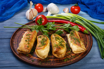 Pancakes with meat and fresh vegetables