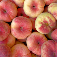 fresh juicy peaches top view closeup, fruit background
