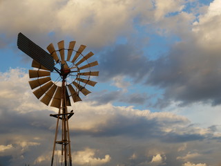 windmill against blue sky