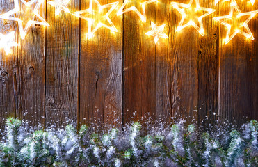 Christmas glowing stars and snow fir