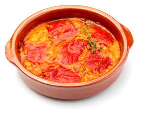 Peppers (del Piquillo) stuffed with meat or fish. Roasted red peppers and fillings made at home. Recipe of Spanish food and Mediterranean diet. With delicious sauce to spread bread. Isolated on white 