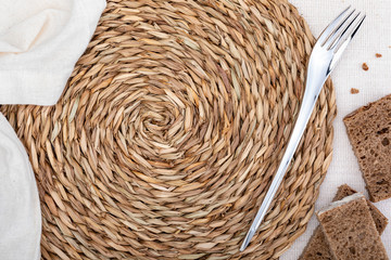 Under plate with space to include a plate, food, ... On delicate pastel-tone matel and slices of bread. Concept to include your food and your text.