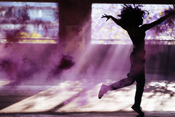 Woman Dancing in Purple Smoke