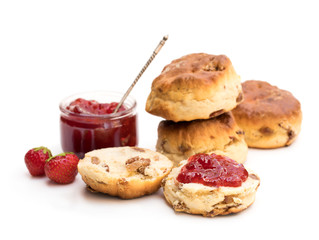 Traditional  scones with fresh strawberries and jam isolated on white