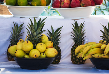 Assorted Fresh Fruits. Pears, Pineapples, Bananas, Apples and Tangerines from Turkey. International Holiday.