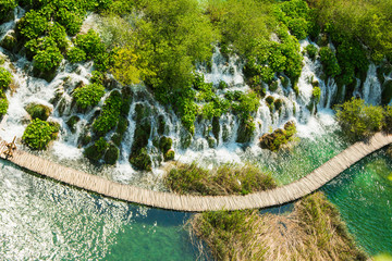Aerial view of Plitvice lakes in Croatia, a famous world tourist heritage sights and wooden 