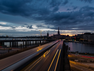 Fototapeta na wymiar long exposure of train at night in stockholm sweden