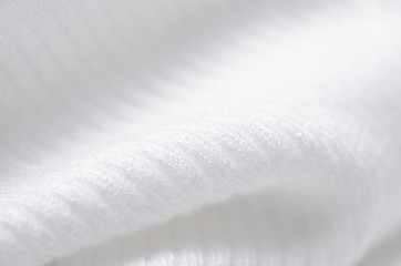 White sweater fabric textile material texture macro blur background