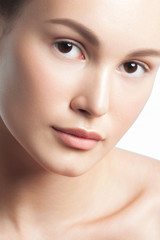 Obraz premium Young beautiful woman with clean perfect skin close-up