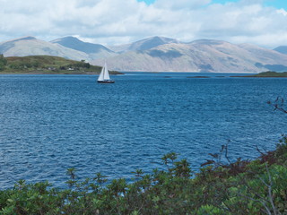 Ship in front of Isle of Lismore
