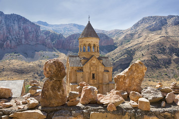 Noravank monastery complex built on ledge of narrow gorge.  Tourist and historical place. Armenia