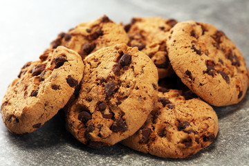 Chocolate cookies on rustic table. Chocolate chip cookies shot