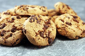 Chocolate cookies on rustic table. Chocolate chip cookies shot