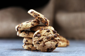 Chocolate cookies on rustic table. Chocolate chip cookies shot