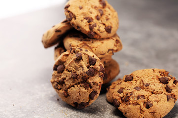 Chocolate cookies on rustic table. Chocolate chip cookies shot
