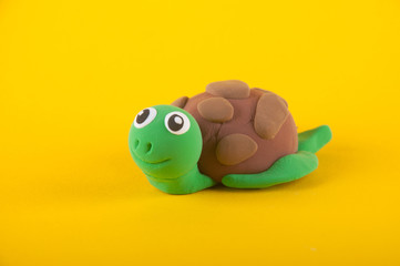 Cute toy turtle made of modelling clay