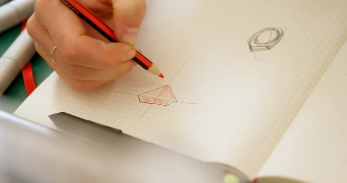 Jewelry designer sketching on white paper 4k